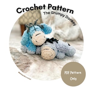 May include: Two light blue crocheted donkey plushies with cream-colored muzzles and dark gray manes. The text reads Crochet Pattern The Grumpy Donkey, #kaileycalicrochet, and PDF Pattern Only. The plushies have stitched eyes and floppy ears.