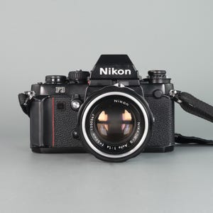 Nikon F3 T HP - Nikkor 50mm F/1.4 Lens - Vintage SLR Camera Nikon F3 T HP - Nikkor 50mm F/1.4 Lens - Vintage SLR Camera