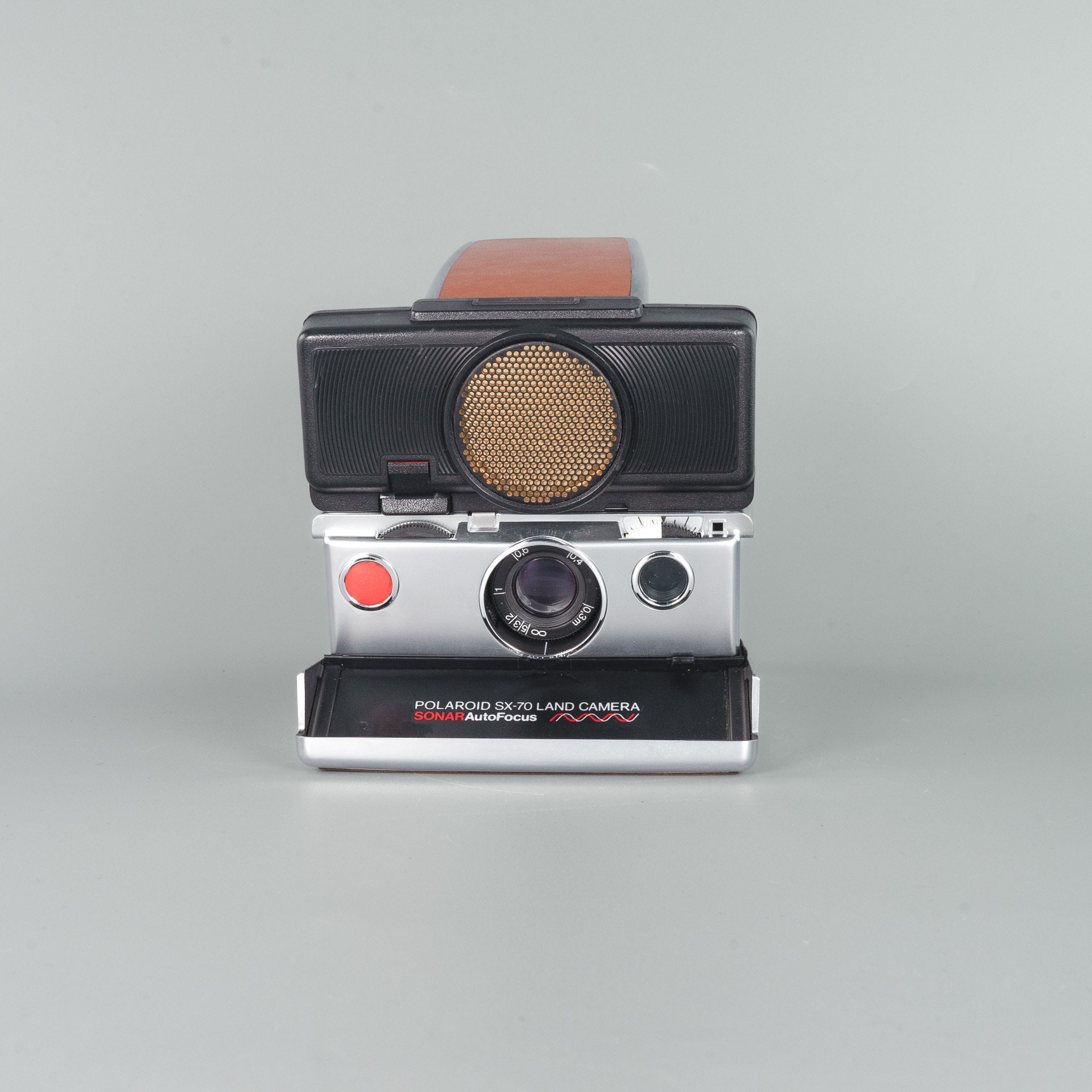 Polaroid SX-70 Sonar AF chrome and Tan Auto Focus Premium Instant 