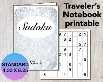 May include: A printable Traveler's Notebook Sudoku puzzle. The cover features the word "Sudoku" in a white oval against a sparkly background. The puzzle is labeled "Vol. 1" and the dimensions are 4.33 x 8.25 inches. A sample puzzle is also shown.