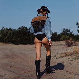 Boho denim jacket with feathers