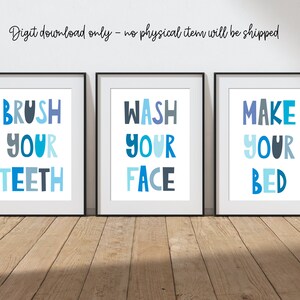 May include: Three framed prints with blue text on a white background. The prints read "BRUSH YOUR TEETH", "WASH YOUR FACE", and "MAKE YOUR BED". The frames are black. The background includes the text "Digit download only - no physical item will be shipped".