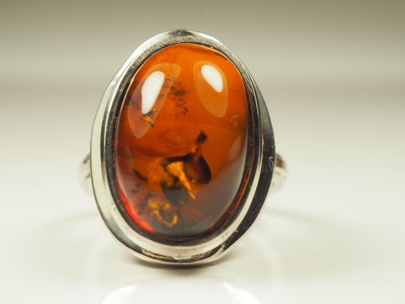 Natural Glossy Cognac color Genuine Baltic Amber ring 6.3 grams.