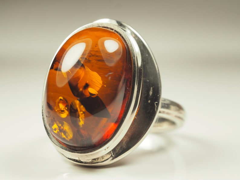 Natural Glossy Cognac color Genuine Baltic Amber ring 6.3 grams.