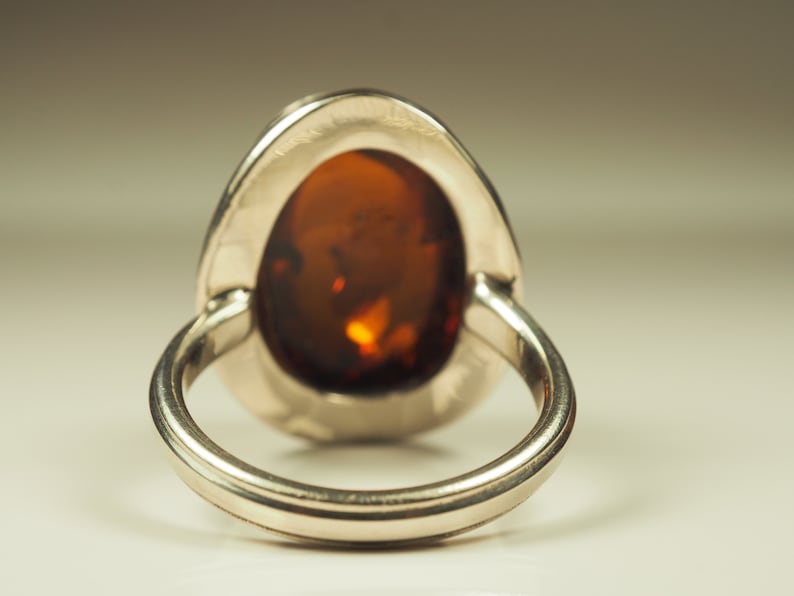 Natural Glossy Cognac color Genuine Baltic Amber ring 6.3 grams.