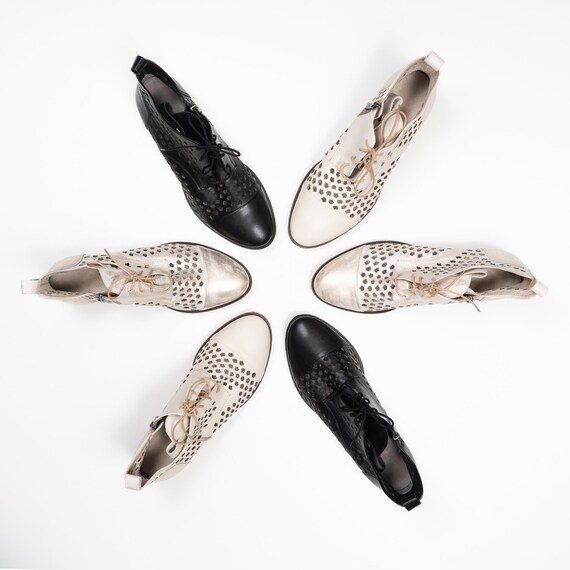 Black and gold womens boots discount