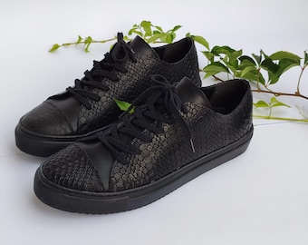 Axel arigato deals snake skin