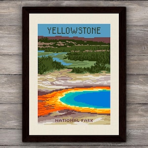 May include: Framed print of Yellowstone National Park. The artwork features a pixelated landscape with a blue sky, green trees, and a colorful hot spring. The text "YELLOWSTONE NATIONAL PARK" is displayed.