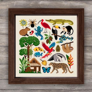 Può includere: Un motivo a punto croce colorato che presenta una varietà di animali e piante native della foresta pluviale. Il motivo include un tucano, un bradipo, un giaguaro, un capibara, una farfalla, una rana, un ragno, un albero, una capanna e un fiume.