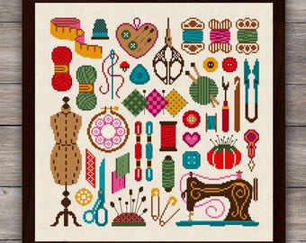 May include: A framed cross-stitch sampler featuring a collection of sewing supplies including a dress form, scissors, spools of thread, buttons, a pincushion, a measuring tape, a thimble, and a vintage sewing machine on a cream-colored fabric background.