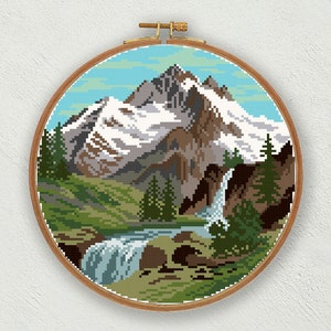 May include: A cross-stitch embroidery pattern of a mountain landscape with a waterfall. The mountain is snow-capped and the sky is blue. The waterfall flows down a rocky cliff into a green valley.