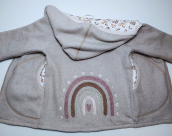 Cotton fleece jacket in size. 104, fully lined, in light beige, with rainbow embroidery