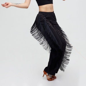 Black tango trousers with tiers of fringe at the sides. Elastic trousers image 1
