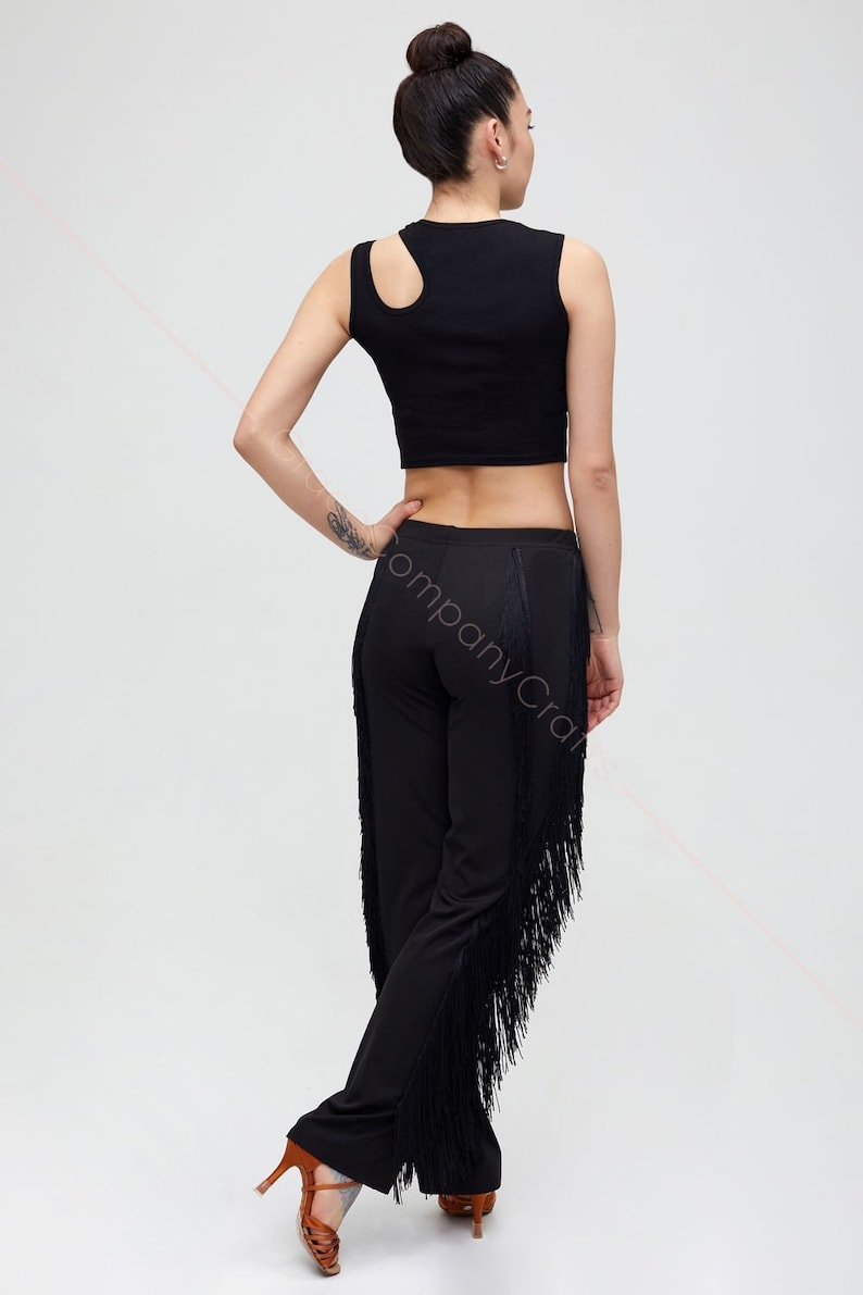 Black tango trousers with tiers of fringe at the sides. Elastic trousers image 3