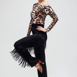 Black tango trousers with tiers of fringe at the sides. Elastic trousers image 2