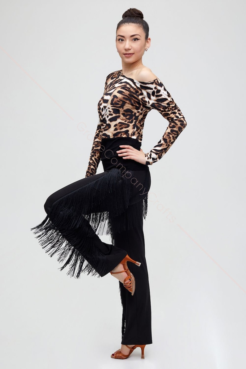 Black tango trousers with tiers of fringe at the sides. Elastic trousers image 2