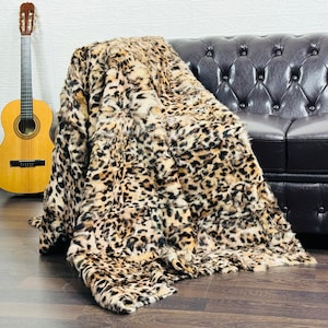 Real rabbit fur rug throw in living room setting