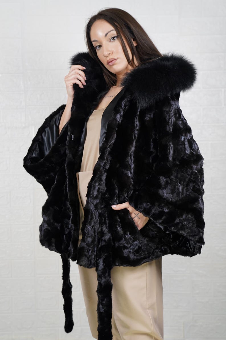 Real mink fur coat for women, offering comfort and elegance for all winter occasions.