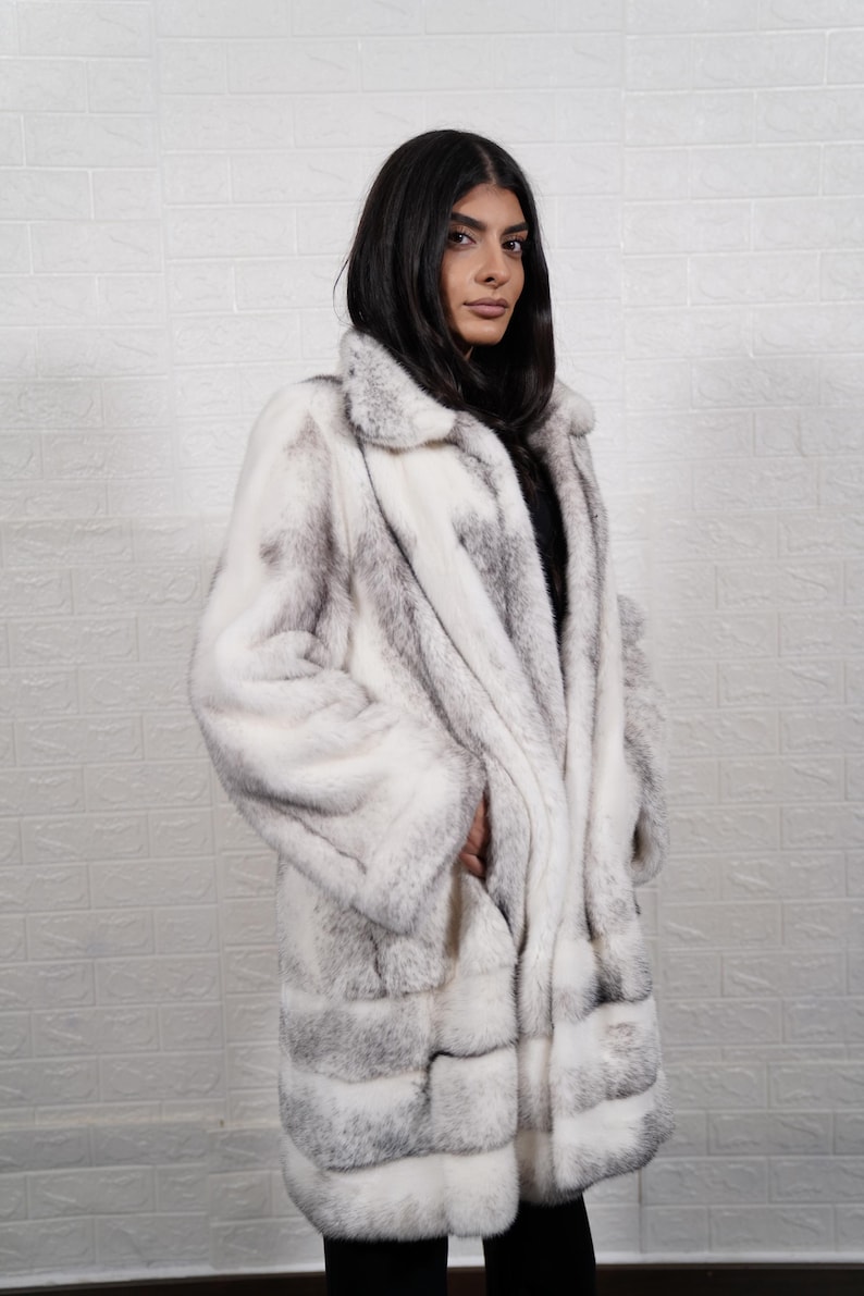 Close up natural black cross mink fur texture real full skin pelts handmade quality soft sheen luxury coat