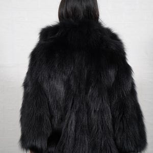 Interior lining of handmade fox fur coat showing quality craftsmanship and construction details of luxury fur jacket