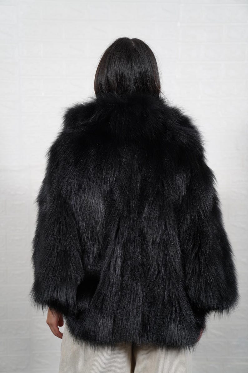 Interior lining of handmade fox fur coat showing quality craftsmanship and construction details of luxury fur jacket