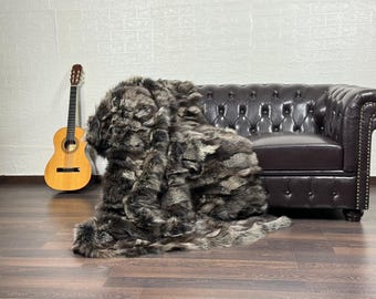 Fox fur throw blanket brown with beige, offering a luxurious bedspread and rug for sophisticated living room and bedroom housewarming decor