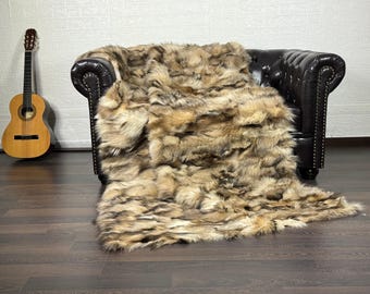 Real fox fur throw blanket with soft beige pattern, elegant bedspread & fox fur rug for living room and bedroom design