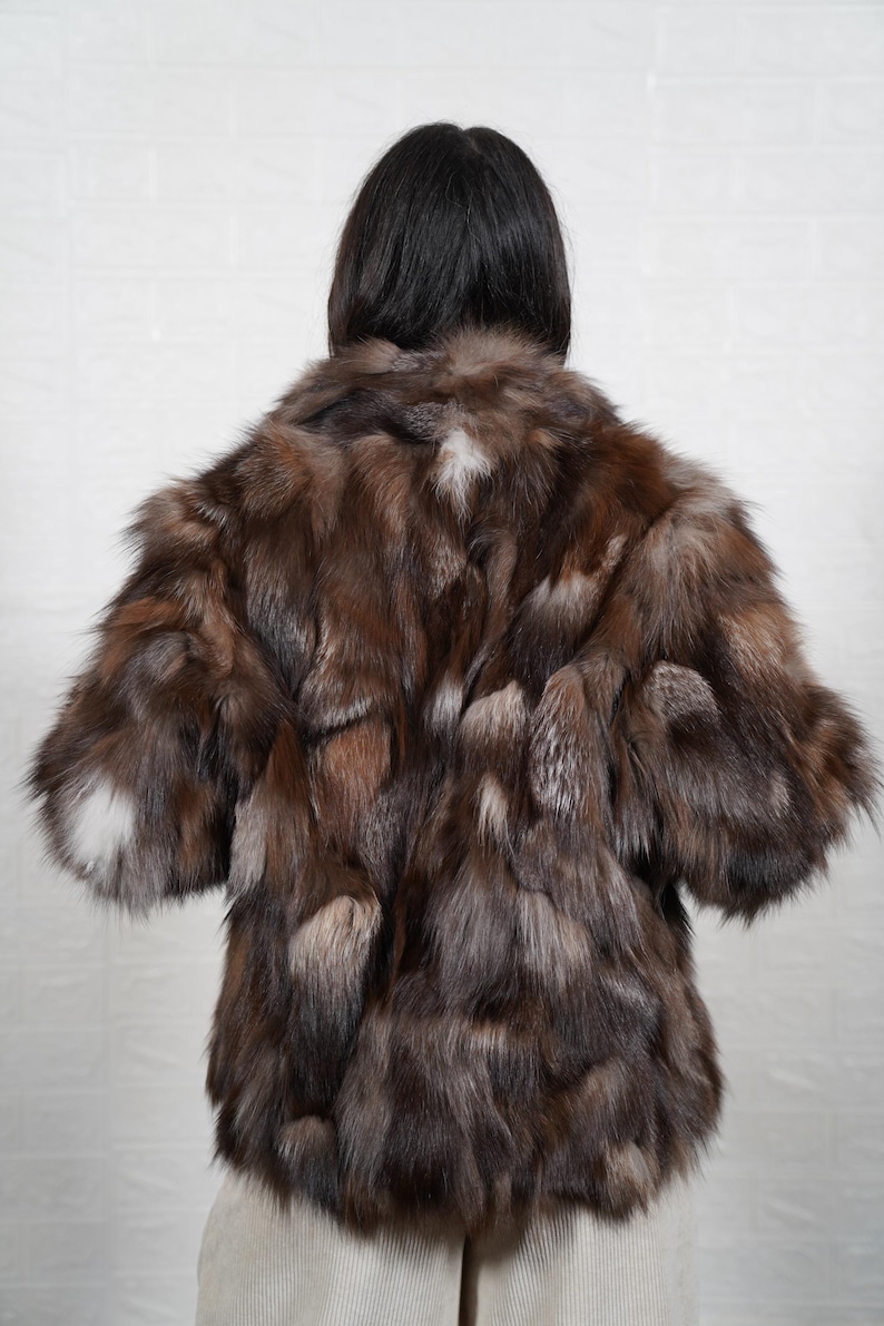 Back view of handmade fox fur coat showing premium fur quality and full length design, luxury women's winter outerwear
