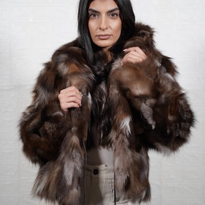 Luxury handmade fox fur coat styled for winter elegance, artisan crafted real fur jacket perfect for formal events and weddings