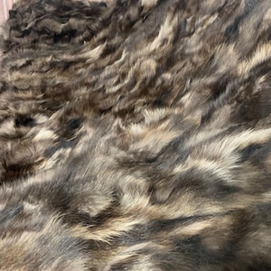 Real fox fur throw blanket with beige and brown pattern, elegant bedspread & fox fur rug for living room and bedroom design
