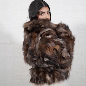 Interior lining of handmade fox fur coat showing quality craftsmanship and construction details of luxury fur jacket
