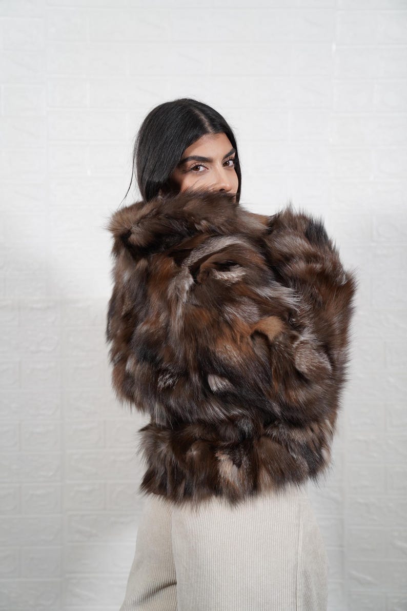 Interior lining of handmade fox fur coat showing quality craftsmanship and construction details of luxury fur jacket