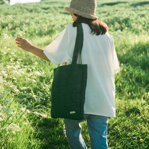 Eco-friendly tote bag made from pure hemp and cotton, handcrafted in Nepal. Features a spacious main compartment and an inner pocket