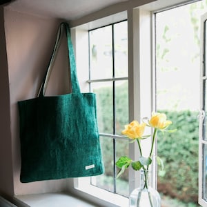 Eco-friendly tote bag made from pure hemp and cotton, handcrafted in Nepal. Features a spacious main compartment and an inner pocket.