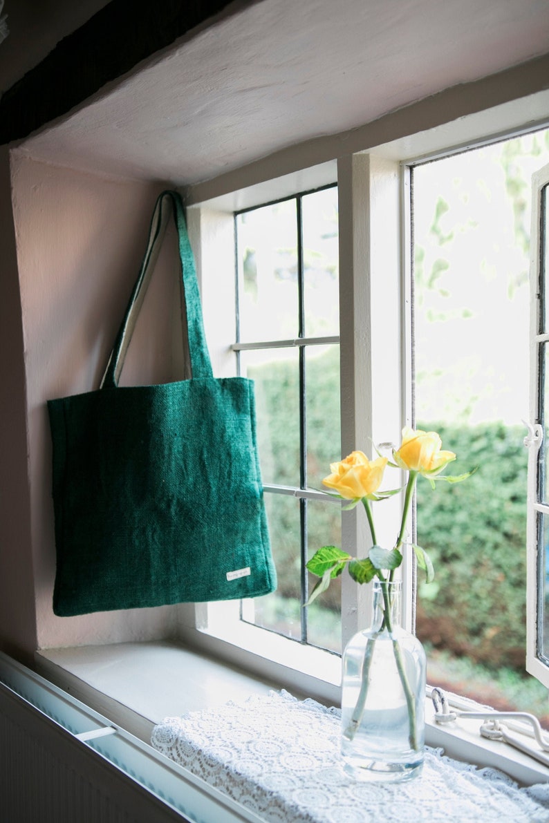Eco-friendly tote bag made from pure hemp and cotton, handcrafted in Nepal. Features a spacious main compartment and an inner pocket.