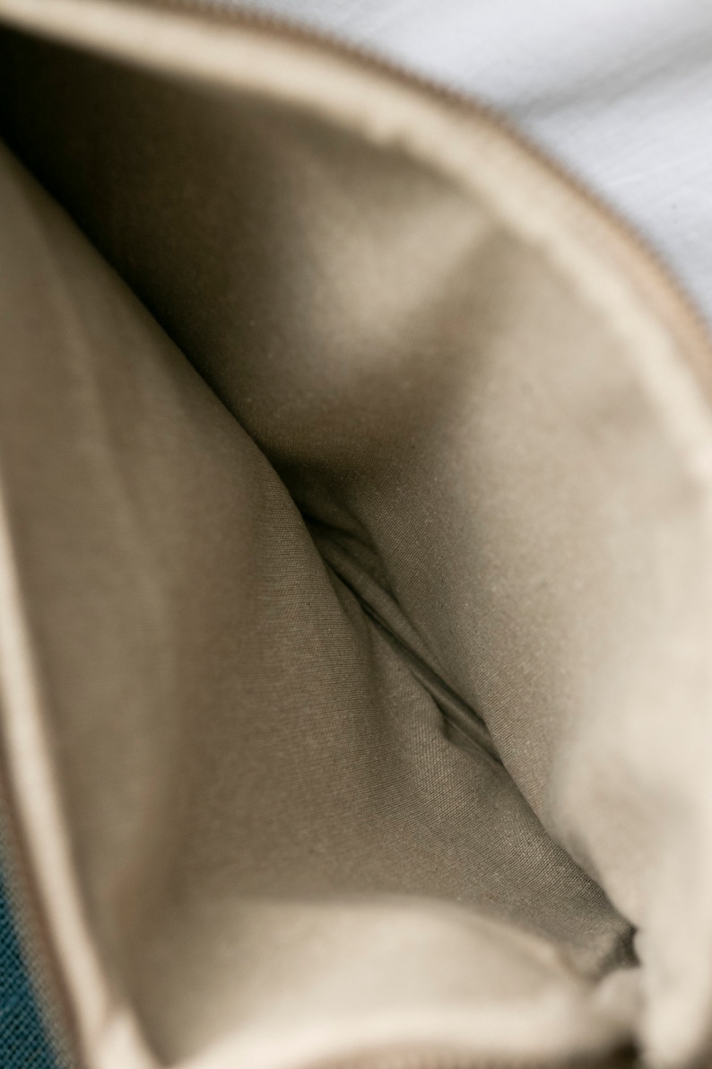 Detailed view of the durable, eco-friendly hemp fabric used in the laptop sleeve, highlighting the natural texture and sustainable materials.