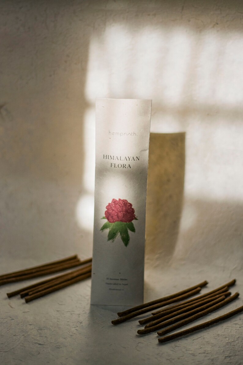 Eco-friendly packaging for rhododendron incense sticks, showcasing sustainable materials and minimalist design for green living.