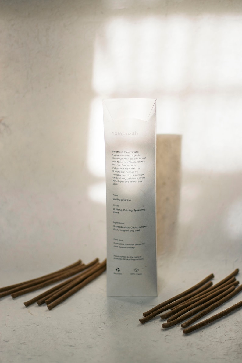 Eco-friendly packaging for rhododendron incense sticks, showcasing sustainable materials and minimalist design for green living.