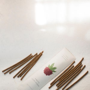 Eco-friendly packaging for rhododendron incense sticks, showcasing sustainable materials and minimalist design for green living.