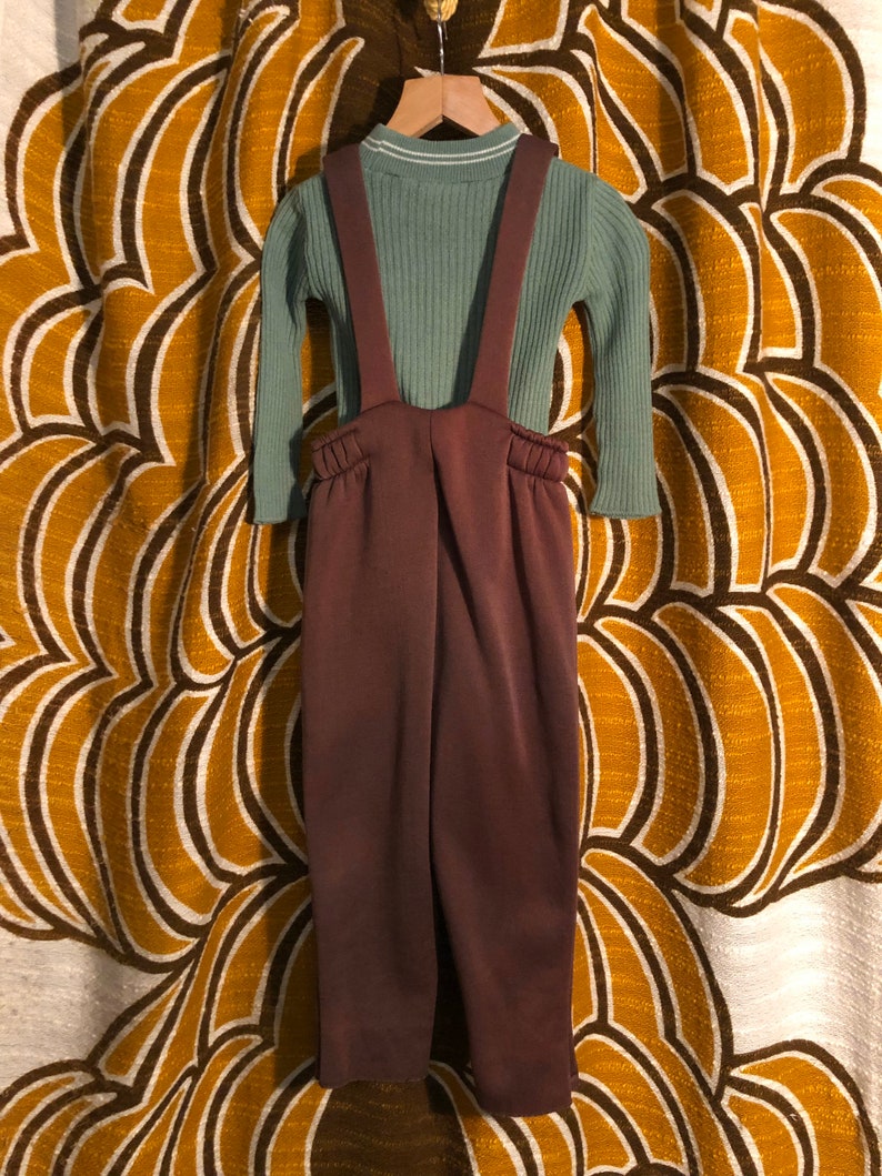 1970\u2019s Unisex kids Brown ski pant trouser with suspender straps.