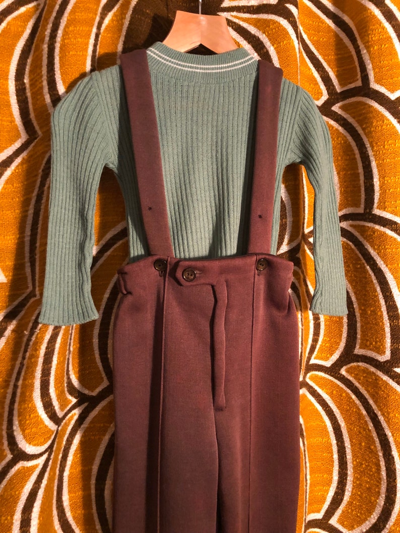 1970\u2019s Unisex kids Brown ski pant trouser with suspender straps.