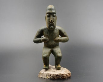 The Olmec guardian, Ancient Olmec figurine, ancient civilization