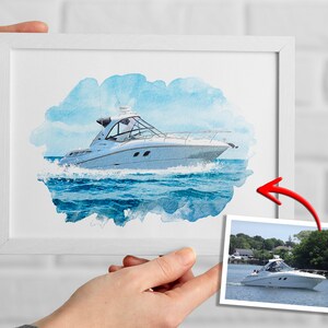 May include: A watercolor painting of a white boat on the water. The boat is in the center of the image and is surrounded by blue water and white clouds. The painting is framed in a white frame.
