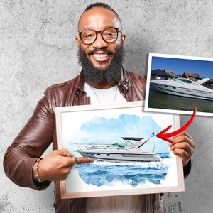 May include: A man is holding a framed watercolor painting of a white motorboat on the water. The painting is a stylized version of a photograph of the same boat.
