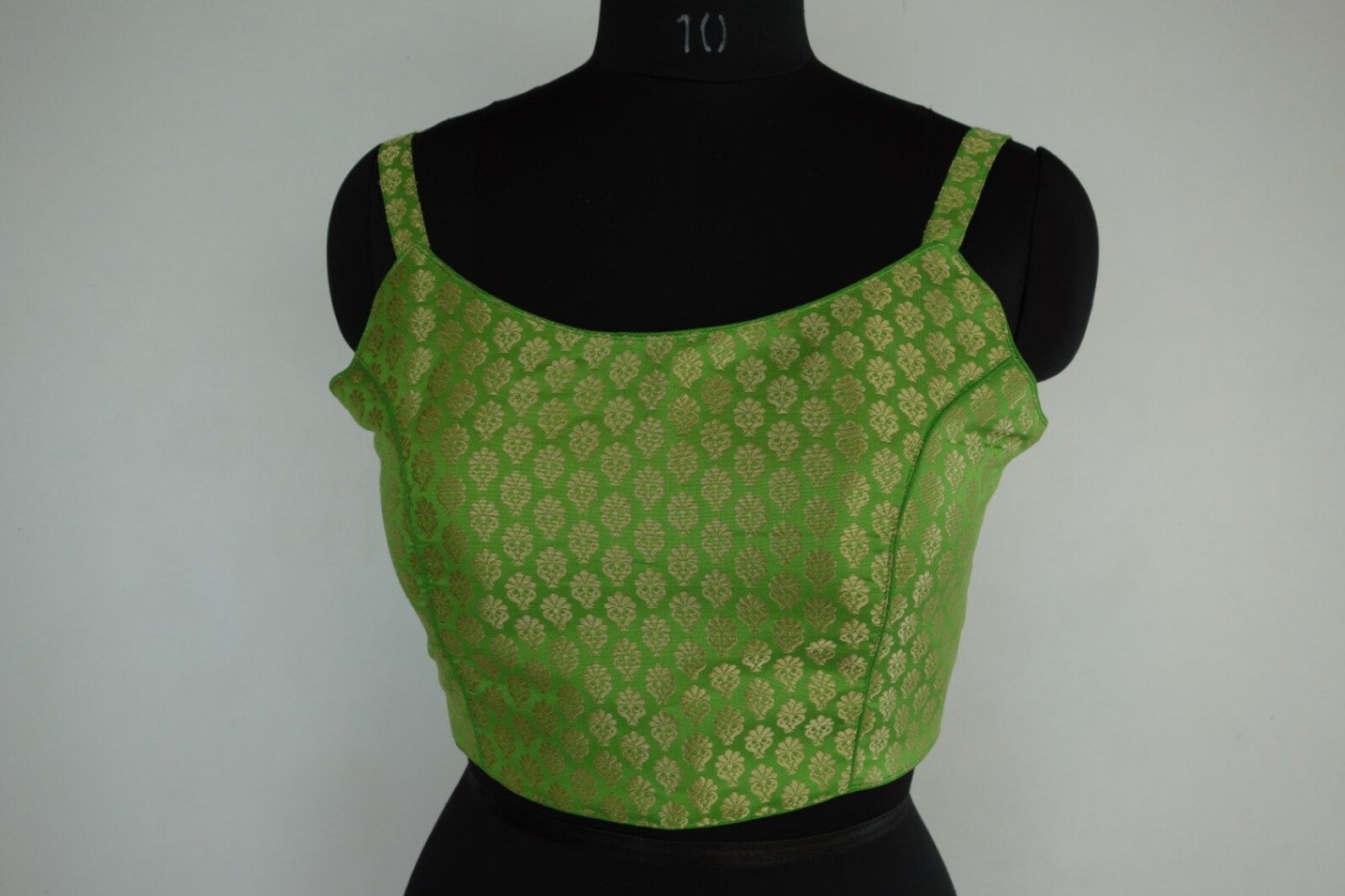 green spaghetti strap