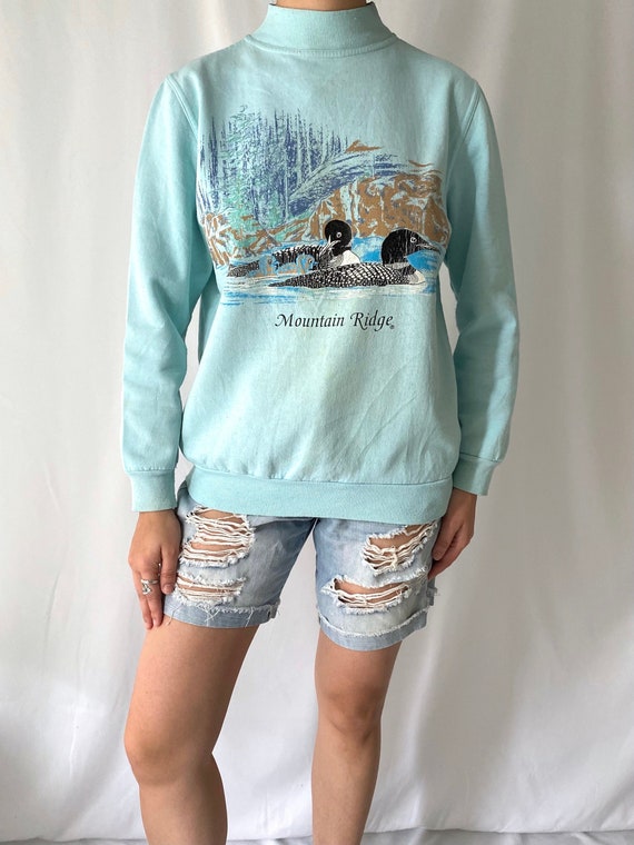 80s vintage light blue loon duck pullover sweatshi