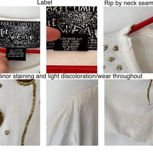 May include: White t-shirt with gold glitter detailing and rhinestones. The shirt has a rip by the neck seam and minor staining and discoloration. The tag reads "Apparel Limited Art Wear".