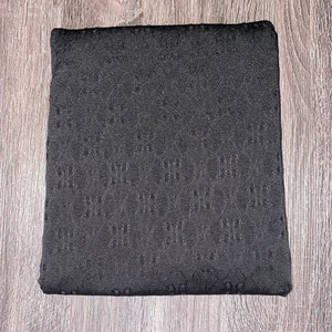Black I: Stretch eyelet