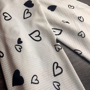 Waffle sweater knit: White black hearts