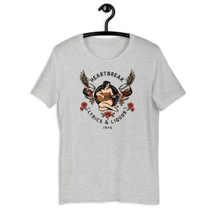Heartbreak Lyrics & Liquor Short-Sleeve Unisex T-Shirt. Retro Pinup Girl Playing Guitar With Whiskey